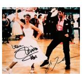 John Travolta and Olivia Newton-John signed...