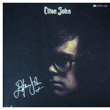 Elton John signed debut album