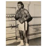 Legendary boxer Muhammad Ali signed photo. GFA...
