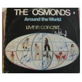 The Osmonds Around the World band signed album