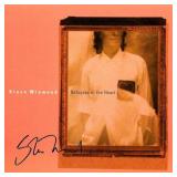 Steve Winwood signed Refugees Of The Heart album