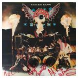 Triumph Rock & Roll Machine band signed album