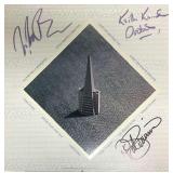 Doobie Brothers signed album Living on the...
