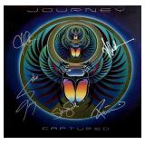 Journey signed Captured album