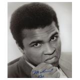 Muhammad Ali signed photo. GFA Authenticated
