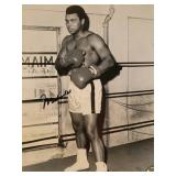 Legendary boxer Muhammad Ali signed photo. GFA...