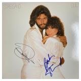Barbra Streisand Guilty signed album. GFA...