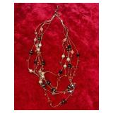 Necklace with gold chain and beads