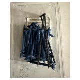 pack of Tapcon blue concrete screw anchors