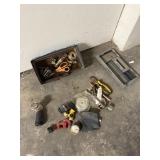 collection of plumbing tools and accessories