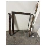 vintage, rusted metal tools, including a large