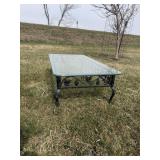 Metal outdoor table with glass top