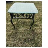 Outdoor metal end table with glass top