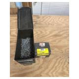 Metal box with assorted nails