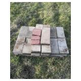 stack of concrete and brick pavers