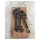 displays a set of vintage metal tools