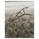 antique iron walk-behind cultivator plow