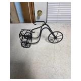 black metal tricycle wine bottle holder