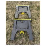 Black and yellow pair of sawhorses