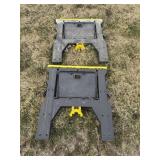 Black and yellow pair of sawhorses