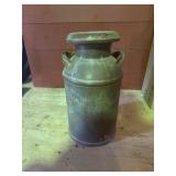 Antique milk can