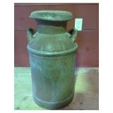 Antique milk can