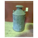 Antique milk can