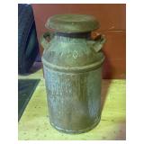 Antique milk can