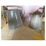 gray enamelware pitchers