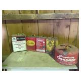 assorted gas and oil cans