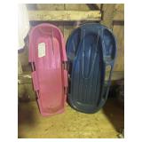 2 plastic sleds