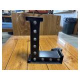 Black battery operated led light up marquee letter