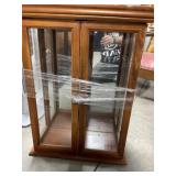 wall-mounted wooden curio cabinet