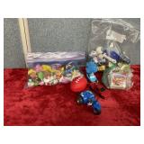 Various erasers and balls and cars in Uno cards,