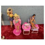 Various Barbie dolls over