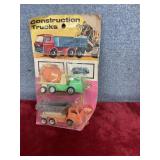 Vintage construction trucks featuring Leslie