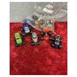 Various sizes of monster trucks