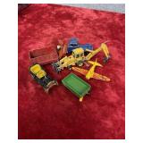 These are vintage diecast farm toys, Tonka or