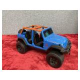 Blue and orange power wheel ride on toy sold