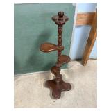 four-tiered wooden swivel plant stand
