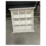 white-painted wooden 9-slot shadow box