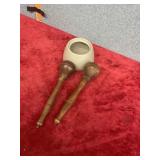 Antique wooden potato smashers and pottery bowl
