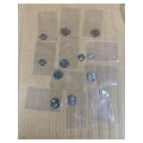 Assorted nickels, quarters and dimes coins