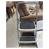 Two step metal ladder