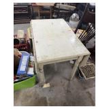 white wooden drop leaf table