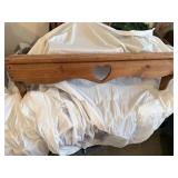 Wooden shelf with heart in middle
