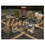 various glass medicine with apothecary bottles