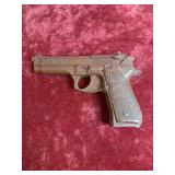 an inert, non-firing training pistol replica