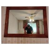 Large wooden frame wall mirror