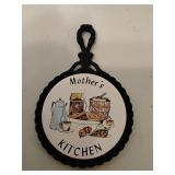 Cast iron and ceramic trivet